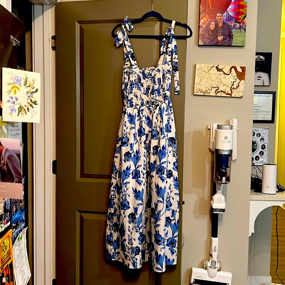 I am selling a cute summer dress. I have worn this a total of three times.